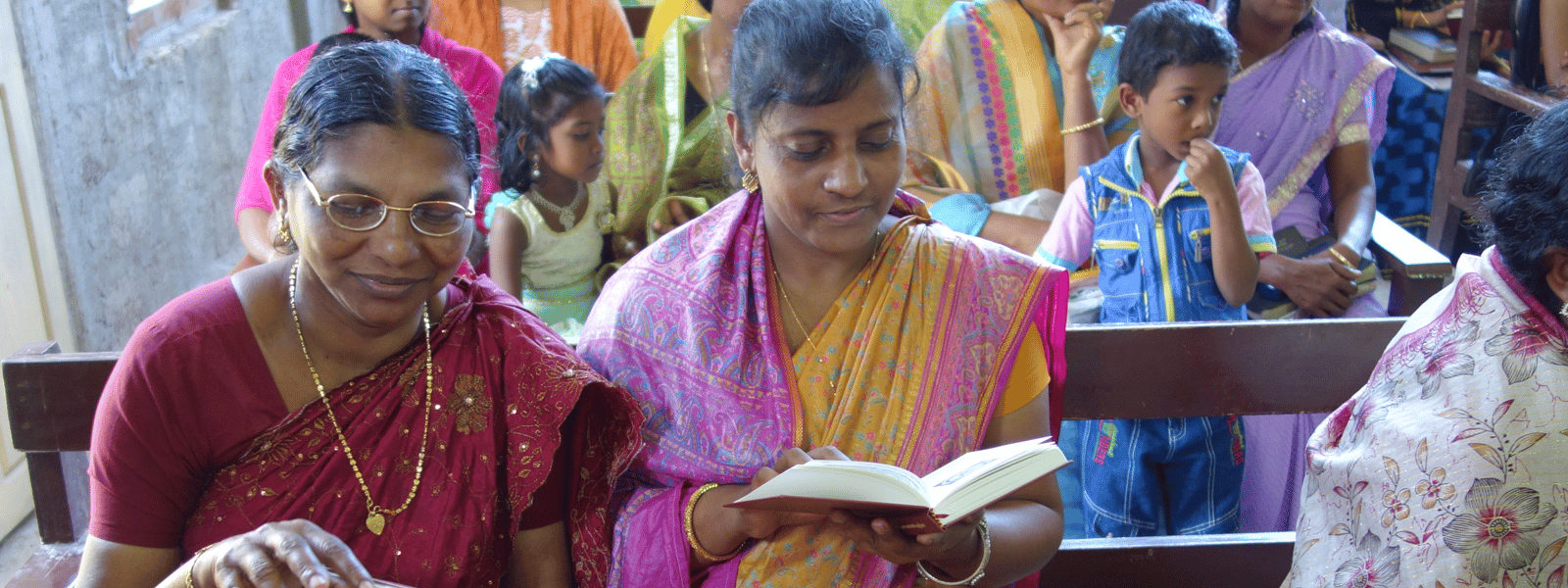 Indian Women Reading Luther's Small Catechism