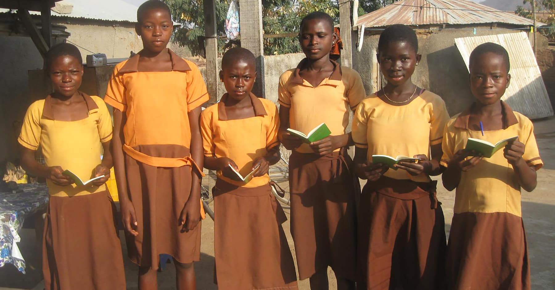Ghana school girls with Luther's Small Catechism