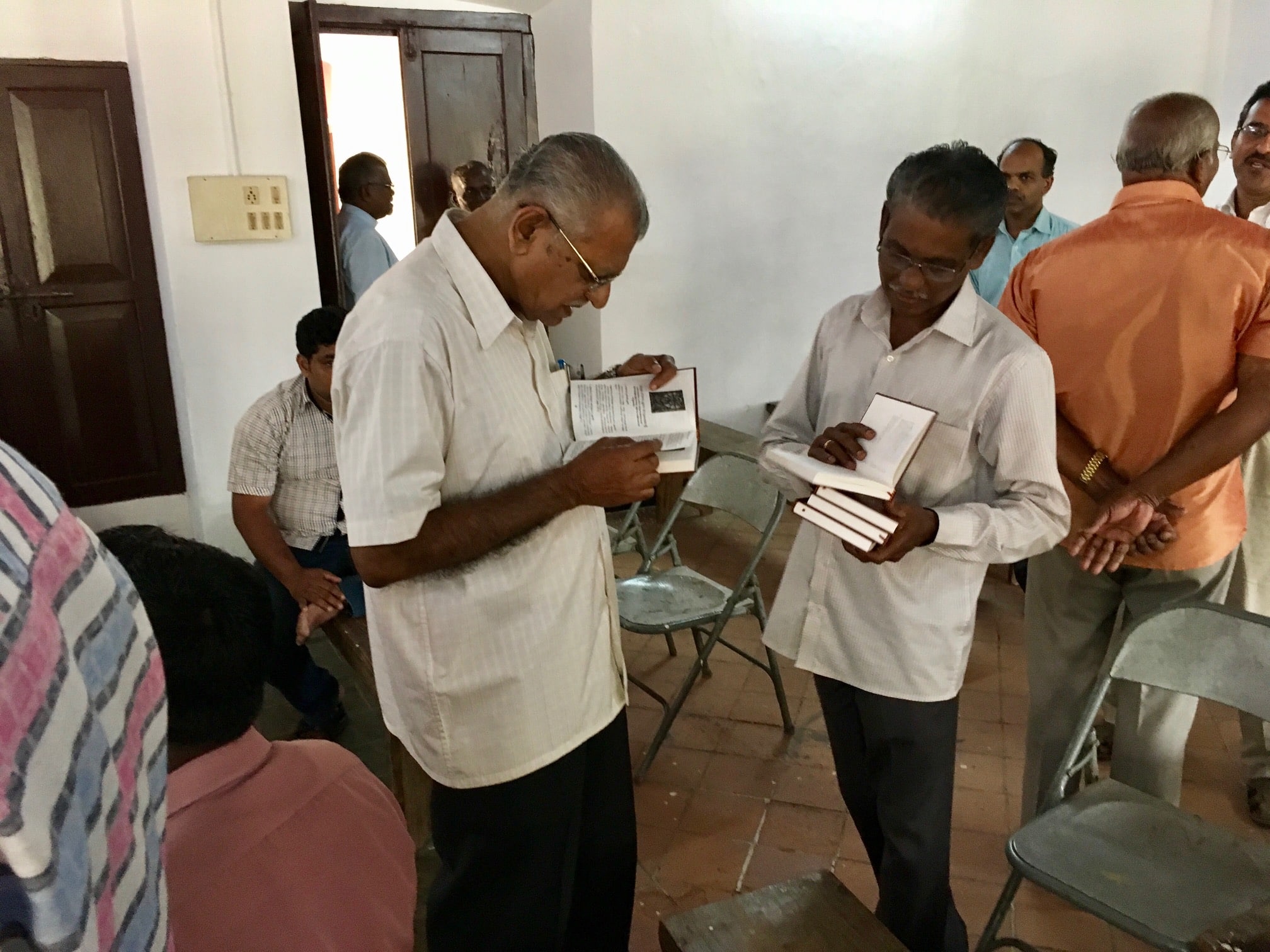 India Men Reading Catechism
