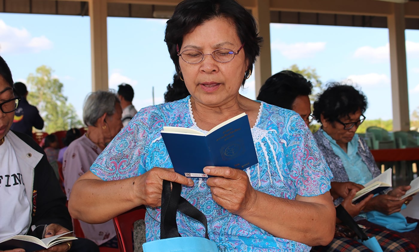 Thai Woman Reading Catechisms
