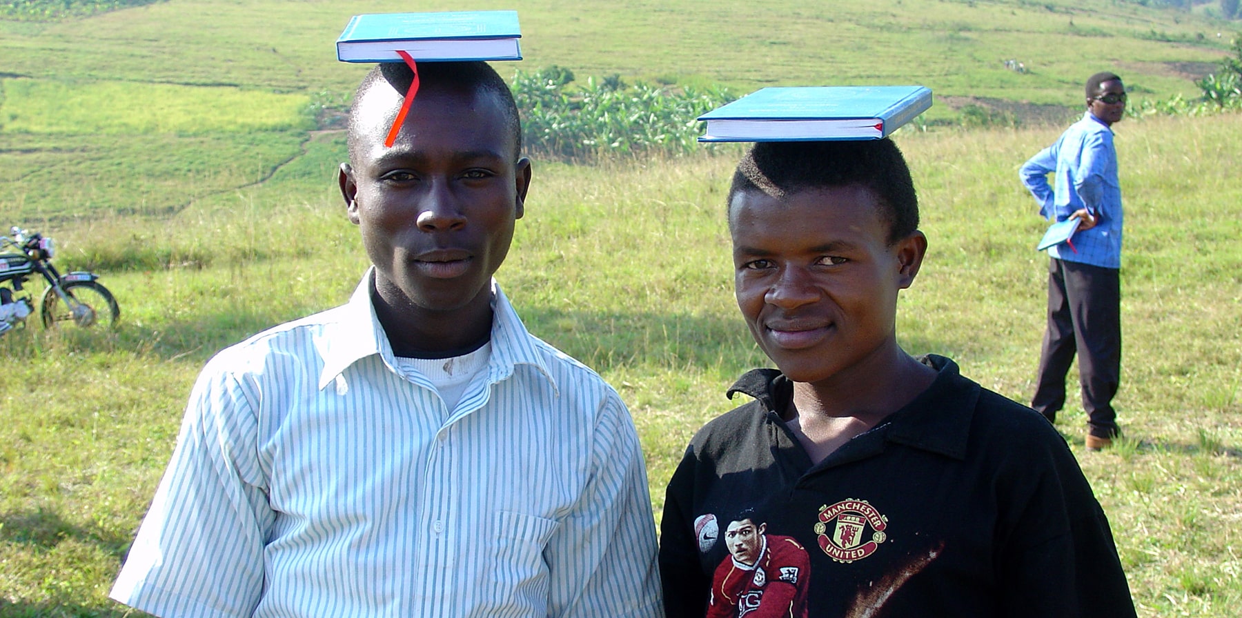 Uganda Boys Balancing Luther's Small Catechisms On Heads
