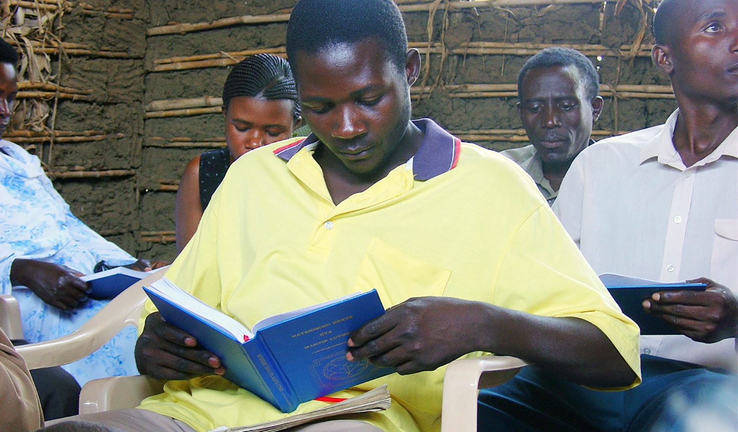 Uganda Young Man Studying Luther's Small Catechism