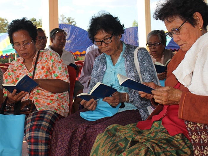 Thai women reading Luther's Small Catechism