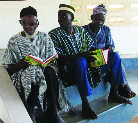 Ghana Chief Reading A Childs Garden of Bible Stories