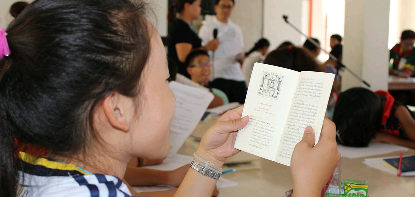 Thai Girl Reading Luther's Small Catechism