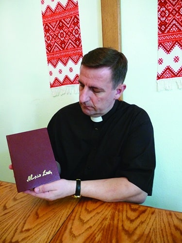 Ukraine Slavik Holding Luther's Works