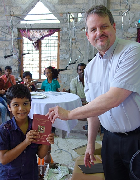 Matt Heise Distributing Luther's Small Catechisms In India