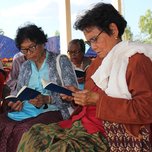 Thai Women reading Luther's Small Catechism