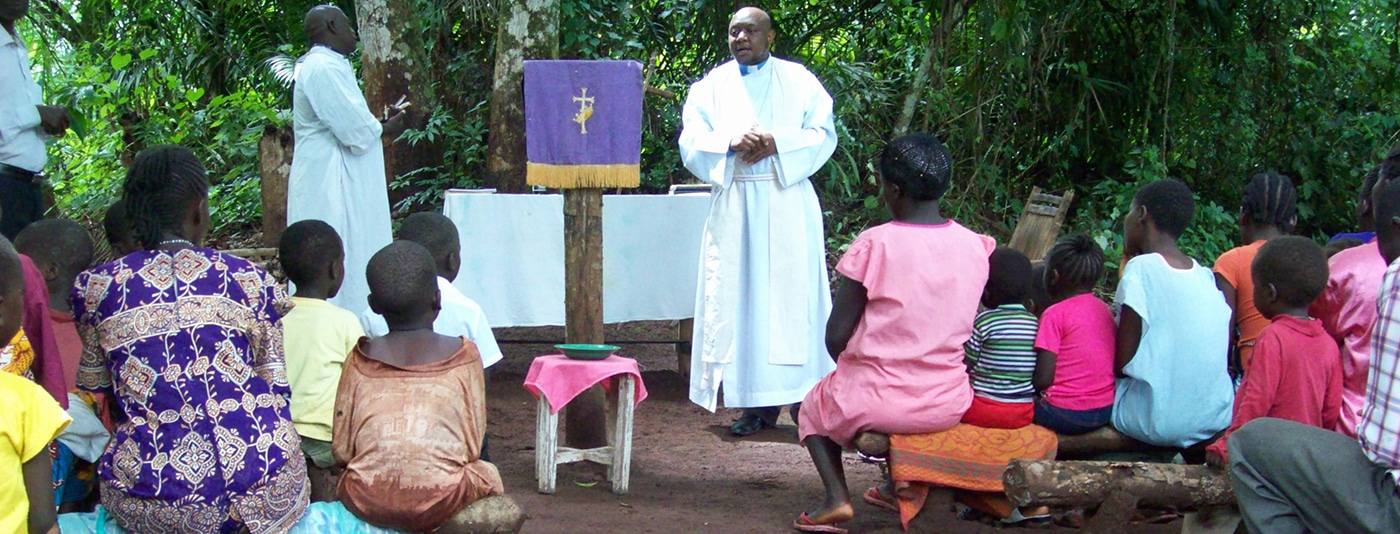 Outdoor service of children in South Sudan led by Bishop Rev. Peter Anibati Abia