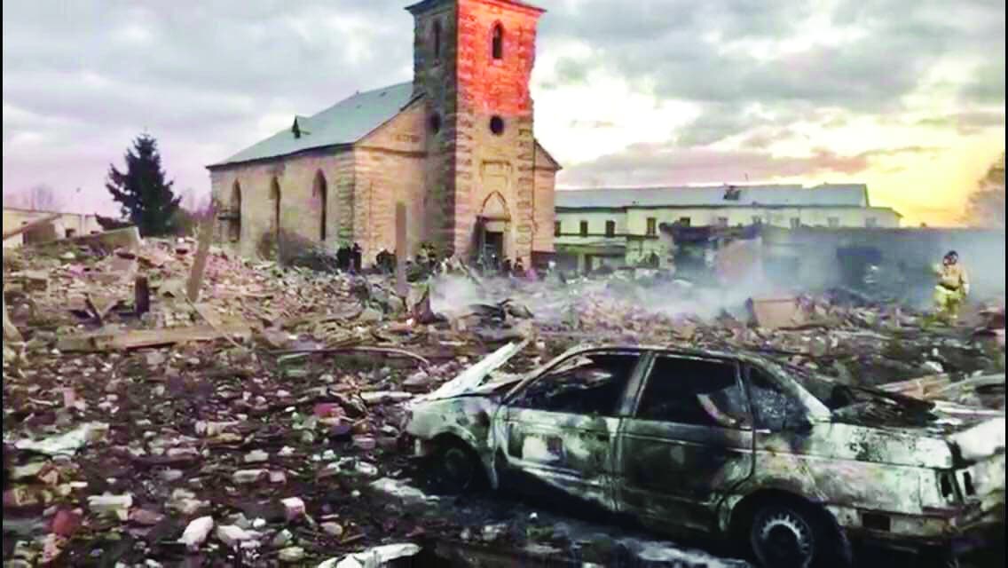 St. Peter church stands amidst rubble and smoke in Russia